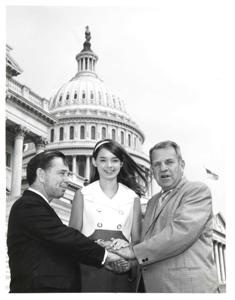 Carl Albert at his desk with two women from the Oklahoma Journal., 1950-01-01 - 1976-12-31