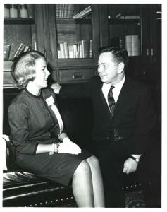 Carl Albert standing under a Will Rogers statue with a member of the joint committee on children and youth., 1950-01-01 - 1976-12-31