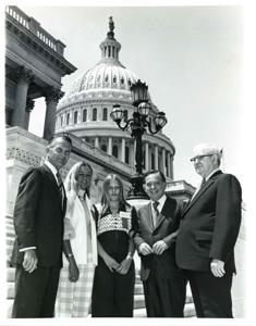 Carl Albert with group under Will Rogers statue., 1950-01-01 - 1976-12-31