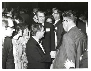 Carl Albert receiving Distinguished Service Citation, at the University of Oklahoma, from George Lynn Cross. May 1962., 1962-05-01
