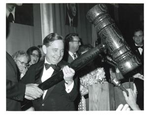 Carl Albert receiving a giant honorary gavel., 1950-01-01 - 1976-12-31