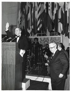 Carl Albert standing at a podium at the American Revolution Bicentennial Ball in Oklahoma. October 2, 1976, 1976-10-02