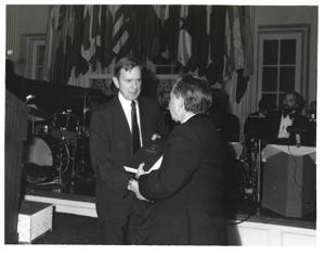 Carl Albert standing at a podium at the American Revolution Bicentennial Ball in Oklahoma. October 2, 1976. Tom Steed is also present., 1976-10-02