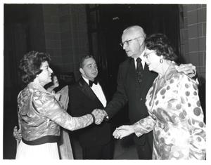 Carl Albert shaking hands with a man at the American Revolution Bicentennial Ball in Oklahoma. October 2, 1976, 1976-10-02