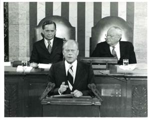 Gerald R. Ford speaking at a joint session of Congress. Carl Albert and James O. Eastland also shown. October 8, 1974, 1974-10-08