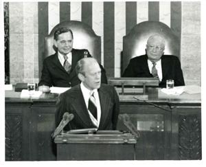 Gerald R. Ford speaking at a joint session of Congress. Carl Albert and James O. Eastland also shown. October 8, 1974, 1974-10-08