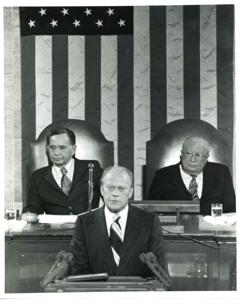 Gerald R. Ford speaking at a joint session of Congress. Carl Albert and James O. Eastland also shown. October 8, 1974, 1974-10-08