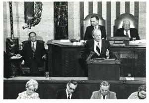 Gerald R. Ford speaking at a joint session of Congress. Carl Albert and James O. Eastland also shown. October 8, 1974, 1974-10-08