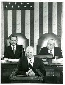Gerald R. Ford speaking at a joint session of Congress. Carl Albert and James O. Eastland also shown. October 8, 1974, 1974-10-08