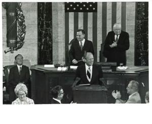 Gerald R. Ford speaking at a joint session of Congress. Carl Albert and James O. Eastland also shown. October 8, 1974, 1974-10-08