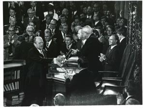 Gerald R. Ford speaking at a joint session of Congress. Carl Albert and James O. Eastland also shown. October 8, 1974, 1974-10-08