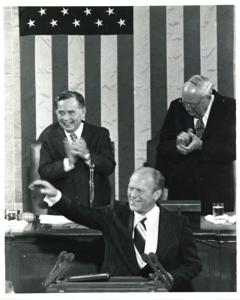 Gerald R. Ford speaking at a joint session of Congress. Carl Albert and James O. Eastland also shown. October 8, 1974, 1974-10-08