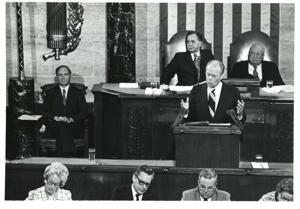 Gerald R. Ford speaking at a joint session of Congress. Carl Albert and James O. Eastland also shown. October 8, 1974, 1974-10-08