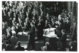Gerald R. Ford speaking at a joint session of Congress. Carl Albert and James O. Eastland also shown. October 8, 1974, 1974-10-08