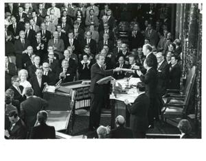 Richard M. Nixon, Gerald R. Ford and Carl Albert shown in the House chambers. December 6, 1973, 1973-12-06