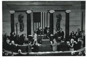 Gerald R. Ford after being sworn into office. From left: Betty Ford, Carl Albert, Gerald R. Ford, James O. Eastland, and Richard M. Nixon. December 6, 1973, 1973-12-06