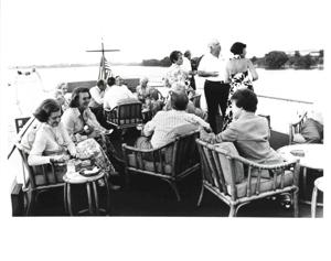 Mary Albert shown with a small group of people aboard the Sequoia. July 22, 1975, 1975-07-22