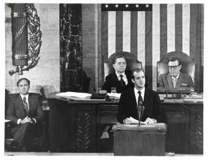 Carl Albert with Bob Hope. Several military officers and congressmen, including Jack Kemp, are in background., 1970-01-01 - 1971-12-31