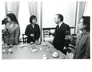 Carl Albert at a luncheon for a Chinese delegation. John Rhodes is pouring wine., 1972-02-22