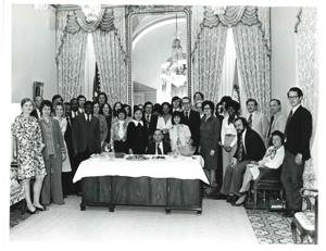 Carl Albert and Mary Albert with a small group of people. Mike Mansfield is standing at right., 1972-02-22