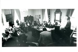 Lyndon B. Johnson shaking hands with a Carl Albert staff member., 1970-01-01 - 1976-12-31