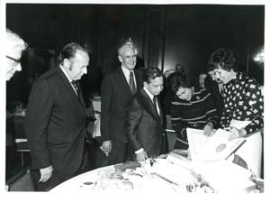 Carl Albert shaking hands with Mike Mansfield at the Roz Wyman luncheon., 1970-01-01 - 1976-12-31
