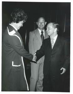 Carl Albert shaking hands with a man. John N. Happy Camp at right., 1950-01-01 - 1976-12-31