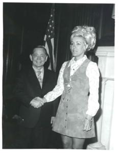 Carl Albert shaking hands with a woman., 1950-01-01 - 1976-12-31