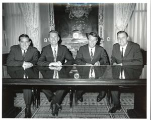 Freshmen senators occupy adjoining seats on the back row of the Senate chamber, 1965-07-01