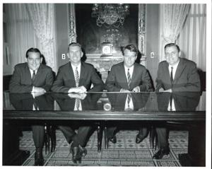 Freshmen senators occupy adjoining seats on the back row of the Senate chamber, 1965-07-01