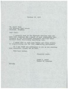 ["James R. Jones congratulates Clell Pond on his outstanding performance on the Preliminary Scholastic Aptitude Test/National Merit Scholarship Qualifying Test and offers assistance with his education."]