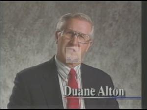 ["In his 1994 political TV ad, Republican candidate Dwayne Alton addresses the urgent need for criminal justice reform. Through a series of scenes of him speaking passionately against office and podium backdrops, Alton emphasizes stronger victim rights and harsher penalties for criminals, presenting himself as a determined advocate for justice and safety."]