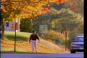 ["In the 1994 political TV ad, Republican candidate Rick Bennett walks confidently through Maine's picturesque landscapes, symbolizing his determination and connection to local values. Surrounded by supportive locals and backed by notable endorsements, the ad showcases Bennett's commitment to leadership and his campaign's grassroots support amidst the scenic beauty of autumn in Maine."]