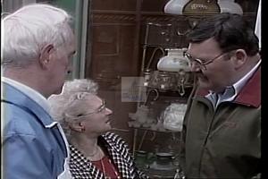 ["In a 1994 political ad, Democratic presidential candidate Duke Tremble presents himself as a confident and determined leader. Scenes show him addressing supportive crowds at various rallies, exuding leadership while speaking confidently at podiums, surrounded by American flags and campaign banners. The campaign emphasizes his readiness to lead with a hopeful and dedicated demeanor."]