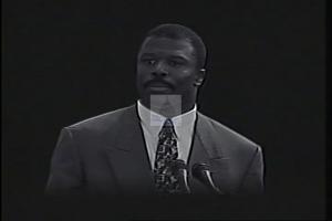 ["In the 1994 presidential campaign ad for Democratic Party candidate Karen McCarthy, scenes portray Karen McCarthy's opponent, Ron Freeman, in various settings demonstrating his aggressive demeanor and radical economic policy stances. Tagged as \"Too Extreme for Missouri,\" the ad underscores Freeman���������s confrontational defense of controversial positions on wage cuts, tax reforms, and Medicare, aiming to depict him as unfavorably radical and unsuitable for Missouri."]