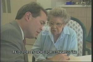 ["In the 1994 political TV ad for Republican candidate Martin Hoke, a series of scenes depict him on a stage, smiling and expressing gratitude toward a formally dressed, applauding audience in a celebratory atmosphere. The ad emphasizes appreciation and connection with supportive constituents, featuring multiple shots of Hoke acknowledging the crowd's applause."]