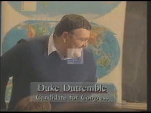 ["The 1994 presidential campaign ad for Democratic candidate Duke Dutremble prominently features him engaging with vibrant, diverse classroom environments. Through a joyful and enthusiastic demeanor, Dutremble is portrayed interacting with students of various backgrounds, symbolizing his commitment and dedication to an inclusive and hopeful educational agenda."]