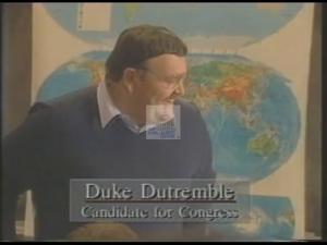 ["The 1994 campaign ad for Democratic candidate Duke Dutremble showcases his interactions with a diverse group of enthusiastic students in a classroom. Throughout the ad, Dutremble is depicted engaging joyfully and attentively with the students, symbolizing his commitment to education, hope, and a diverse, inclusive future. This consistent theme vividly portrays his priorities and care for youth and education."]