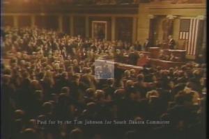 ["The 1988 political TV ad for Tim Johnson emphasizes his commitment and effectiveness as a congressman. It showcases scenes of him taking the oath, working diligently at his desk, and speaking persuasively in the House Chamber. Colleagues listen intently, demonstrating his respect across the aisle and his leadership in significant legislative negotiations. The ad portrays Johnson as a dedicated and influential leader."]